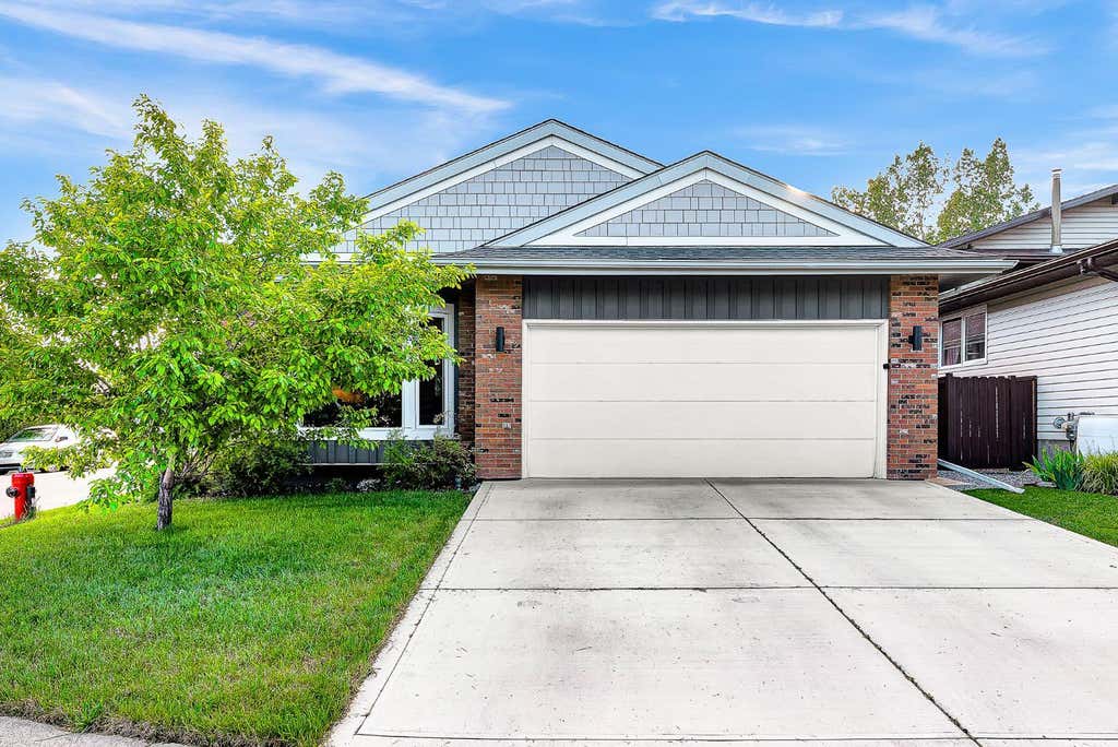 Photo of 120 Woodbrook Close SW, Calgary, AB T2W 4E9 (MLS # A2318650)