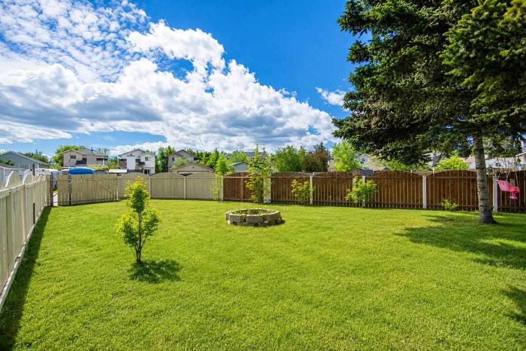 Photo of 27 Erin Green Place SE, Calgary, AB T2B 3C2 (MLS # A2318315)