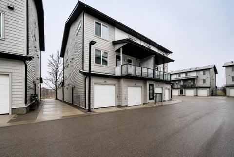 Photo of 245 Redstone Walk NE #202, Calgary, AB T3N 1M6 (MLS # A2327755)