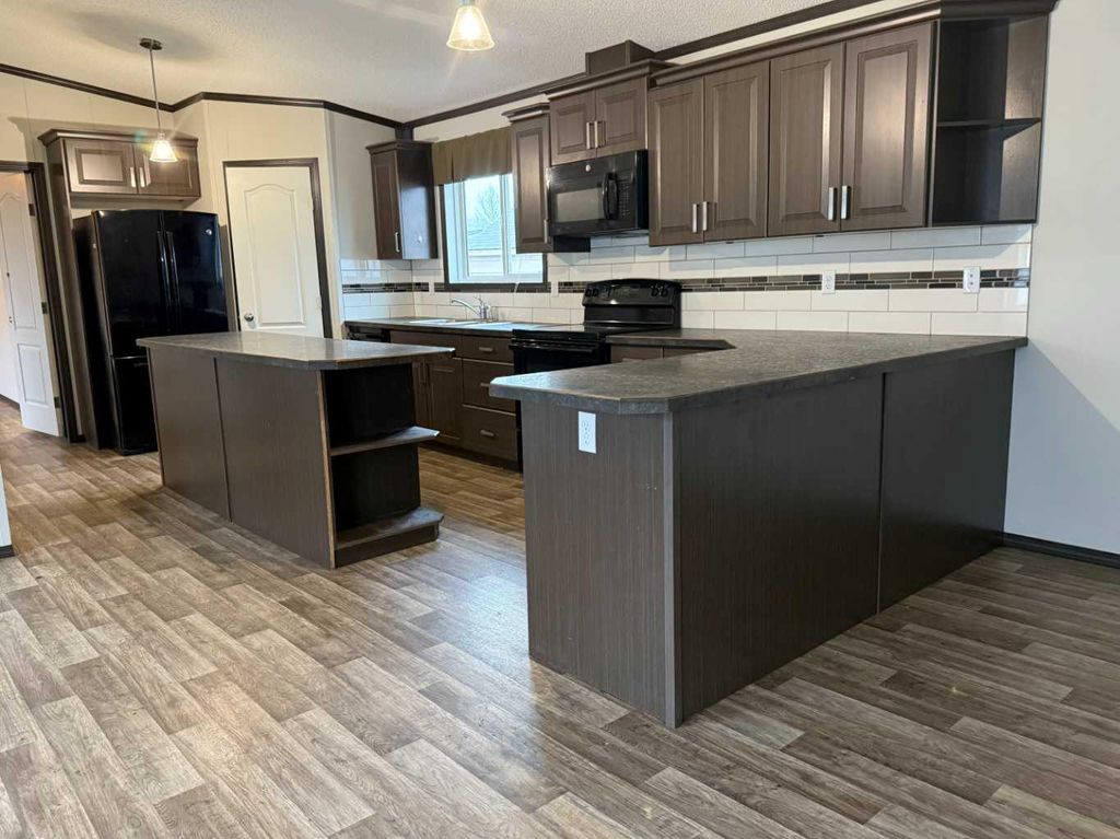 Photo of 109 Card Crescent, Fort McMurray, AB T9K 2H6 (MLS # A2286769)