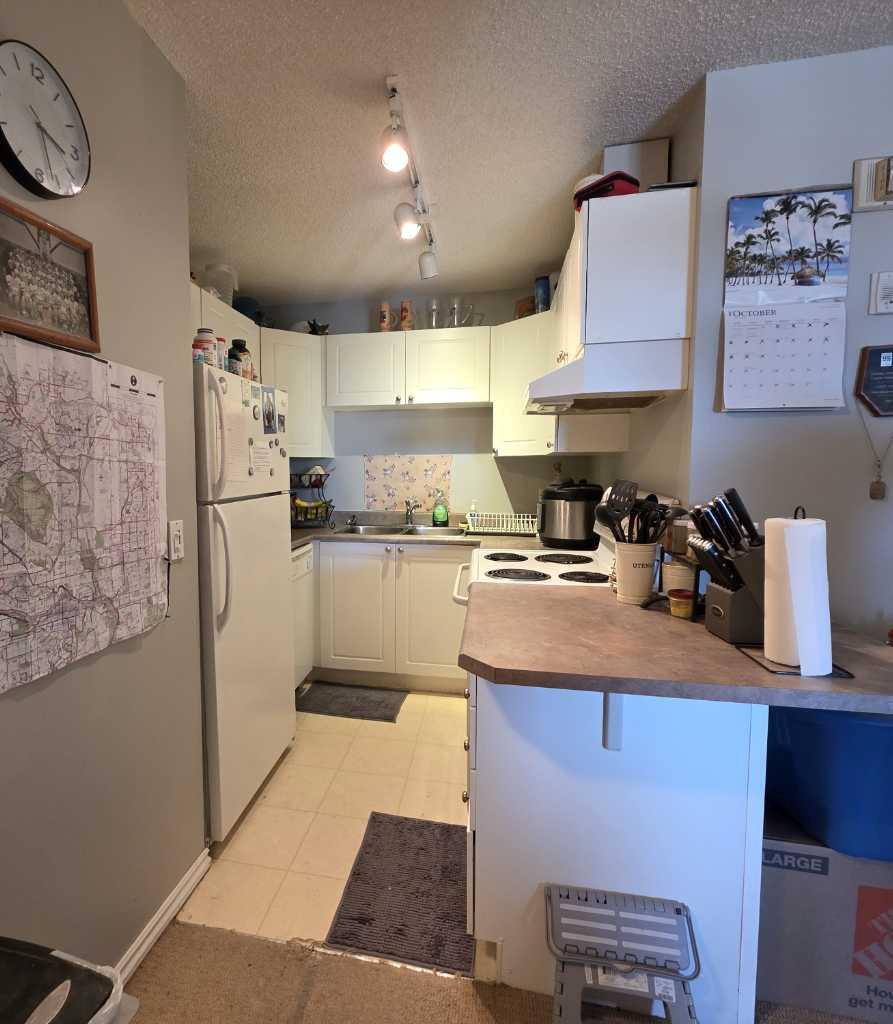 9 Country Village Bay NE 404