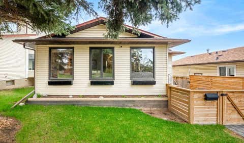 Photo of 20 Bedwood Hill NE, Calgary, AB T3K 1L9 (MLS # A2335316)