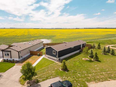 Photo of 2037 Sunflower Crescent, Coaldale, AB T1M 0G4 (MLS # A2328233)