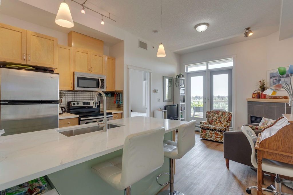 Photo of 24 Hemlock Crescent SW #3608, Calgary, AB T3C 2Z1 (MLS # A2286109)