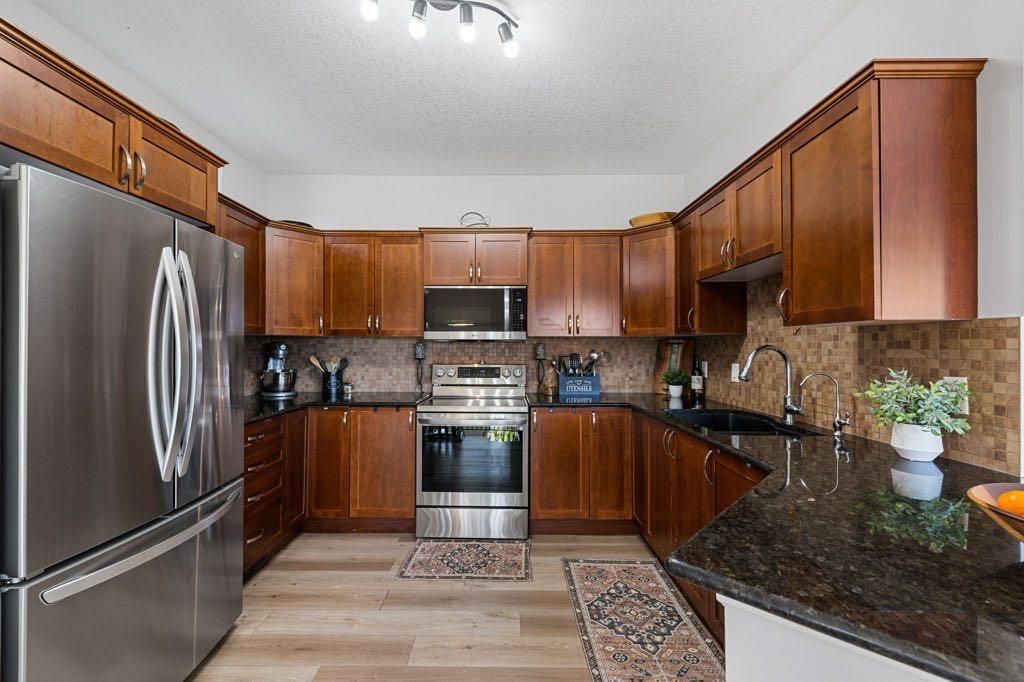 Photo of 528 Rocky Vista Gardens NW, Calgary, AB T3G 0B7 (MLS # A2302763)