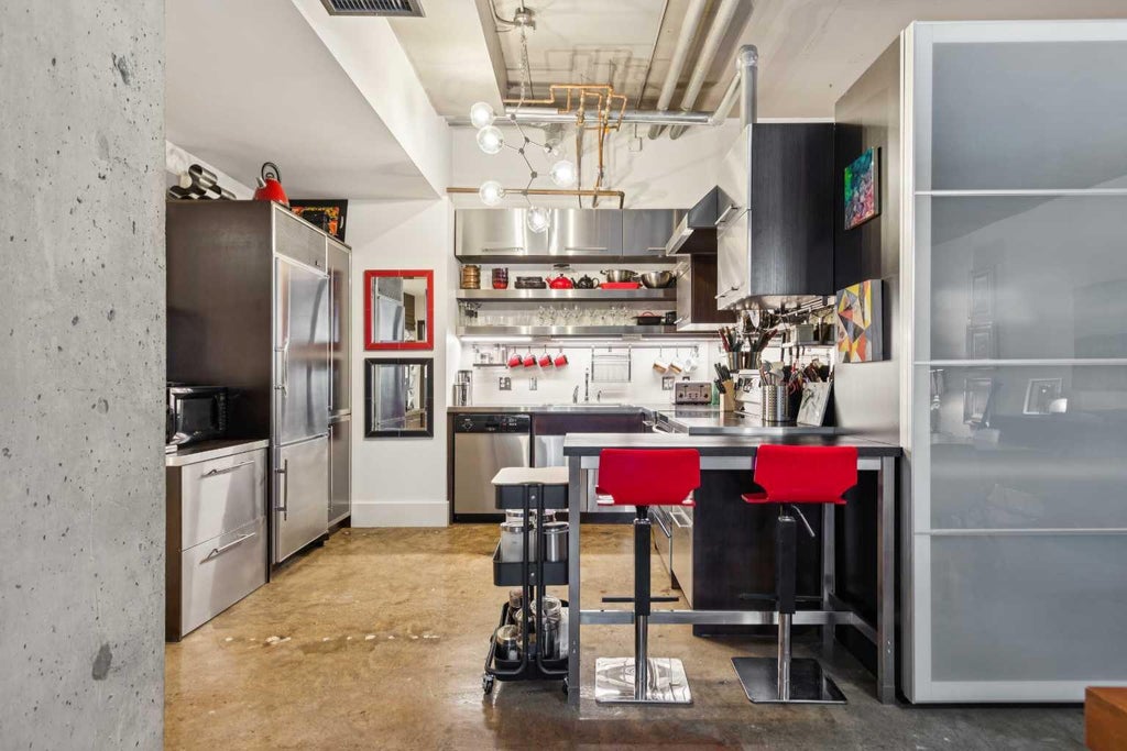 Photo of 500 Eau Claire Avenue SW #102D, Calgary, AB T2P 3R8 (MLS # A2355364)