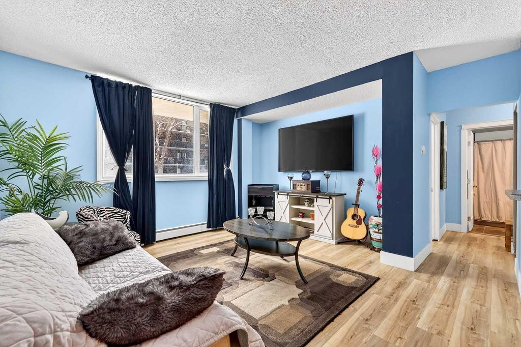 Photo of 1312 13 Avenue SW #102, Calgary, AB T3C 0T3 (MLS # A2296915)