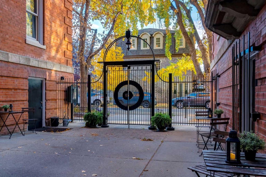 Photo of 804 18 Avenue SW #203, Calgary, AB T2T 0G8 (MLS # A2351650)