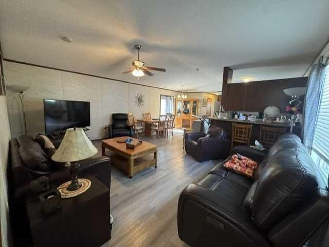 Photo of 15 Mackenzie Ranch Way #26, Lacombe, AB T4L 0A7 (MLS # A2346008)