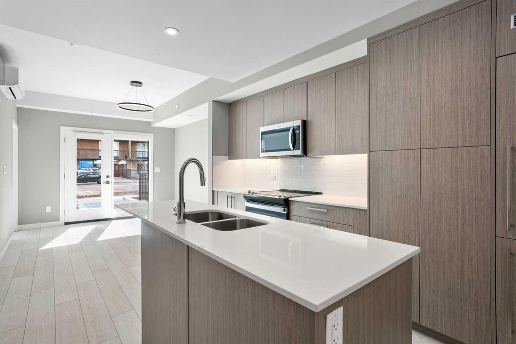 Photo of 310 15 Avenue SW #111, Calgary, AB T2R 1S9 (MLS # A2293327)