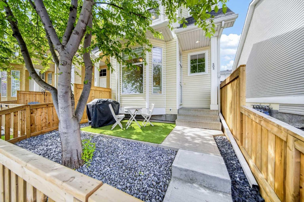 Photo of 203 McKenzie Towne Gate SE, Calgary, AB T2Z 4G2 (MLS # A2317643)