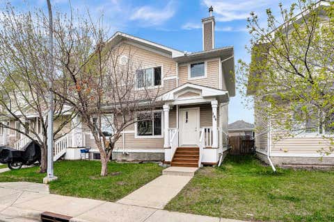 Photo of 164 Bridleridge Gardens SW, Calgary, AB T2Y 4L4 (MLS # A2308685)