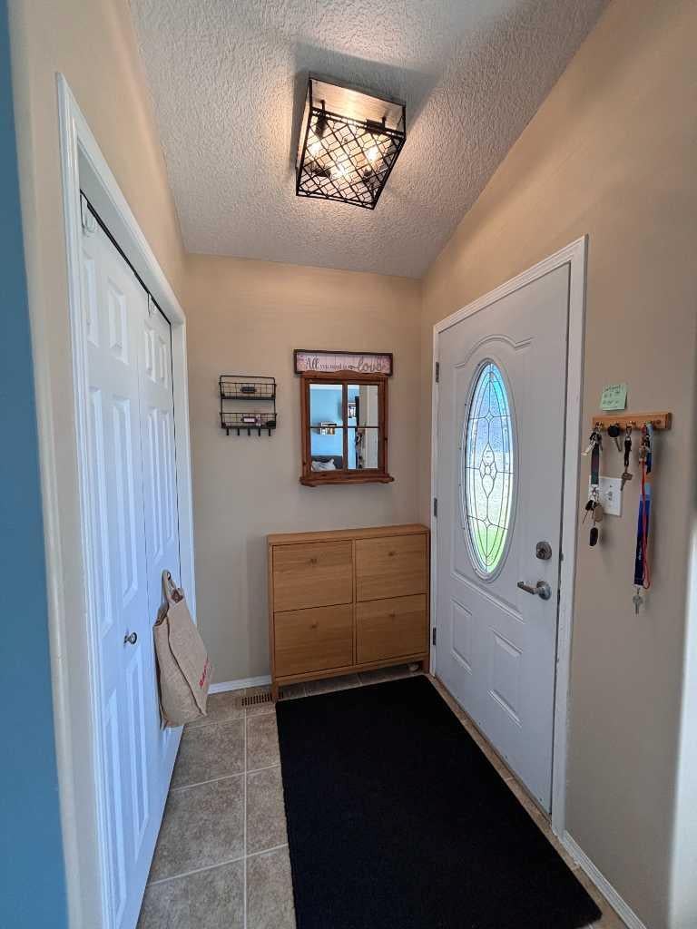 Photo of 75 Kodiak Crescent N, Lethbridge, AB T1H 6S4 (MLS # A2345348)