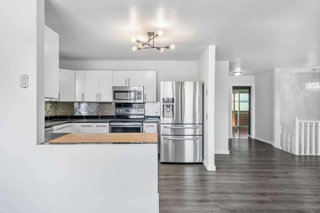 Photo of 6824 Temple Drive NE, Calgary, AB T1Y 4X8 (MLS # A2340223)