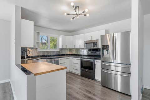 Photo of 6824 Temple Drive NE, Calgary, AB T1Y 4X8 (MLS # A2340223)