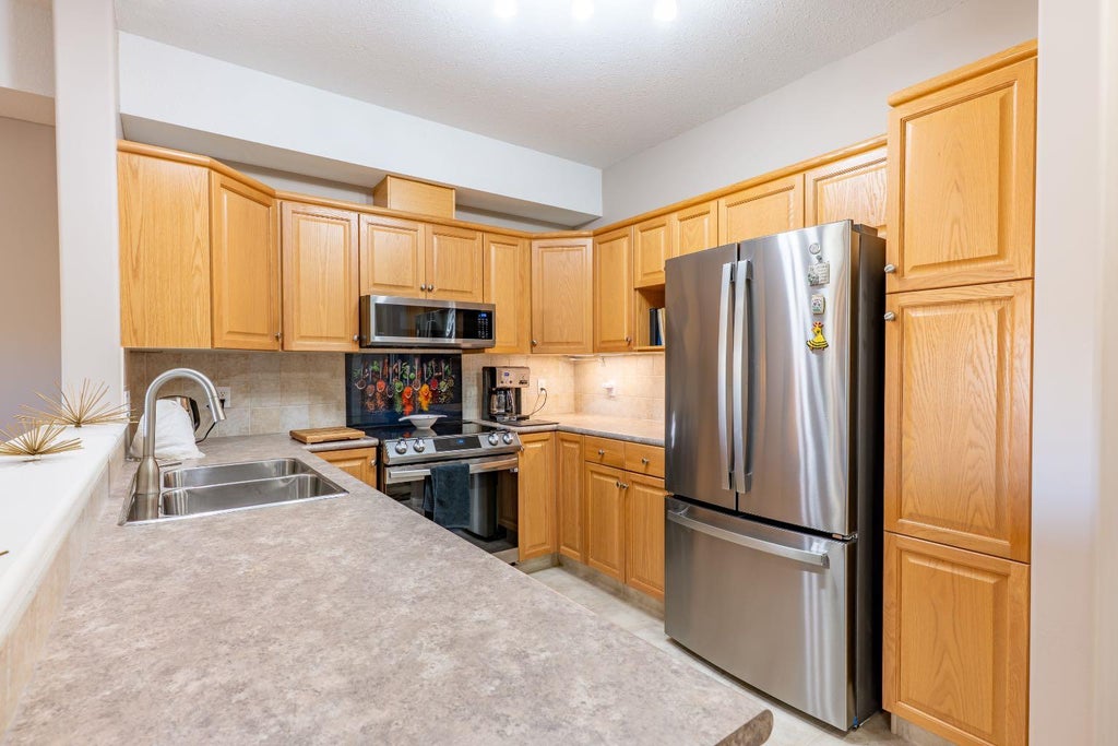 Photo of 29 River Ridge Drive NW #418, Medicine Hat, AB T1A 8V3 (MLS # A2352931)
