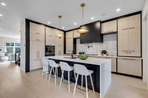 Photo of 336 Normandy Drive SW, Calgary, AB T3E 7J6 (MLS # A2307171)