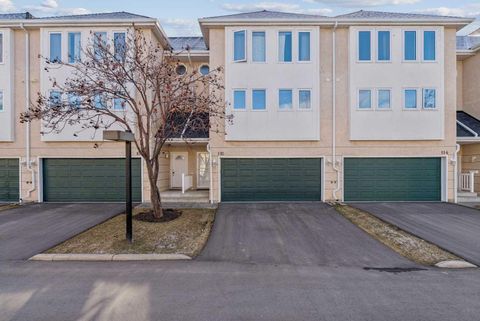 Photo of 110 Candle Terrace SW, Calgary, AB T2W 6G7 (MLS # A2300871)