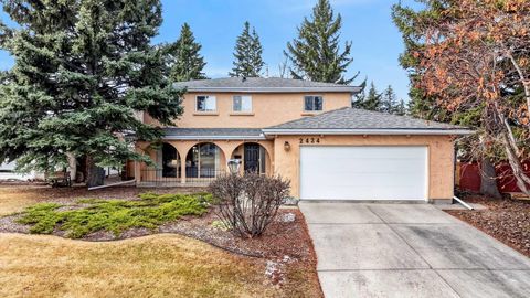 Photo of 2424 Palisade Drive SW, Calgary, AB T2V 3V3 (MLS # A2297649)