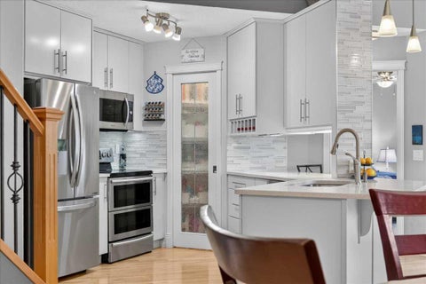 Photo of 248 Springbank Villas SW, Calgary, AB T3H 5P7 (MLS # A2351344)
