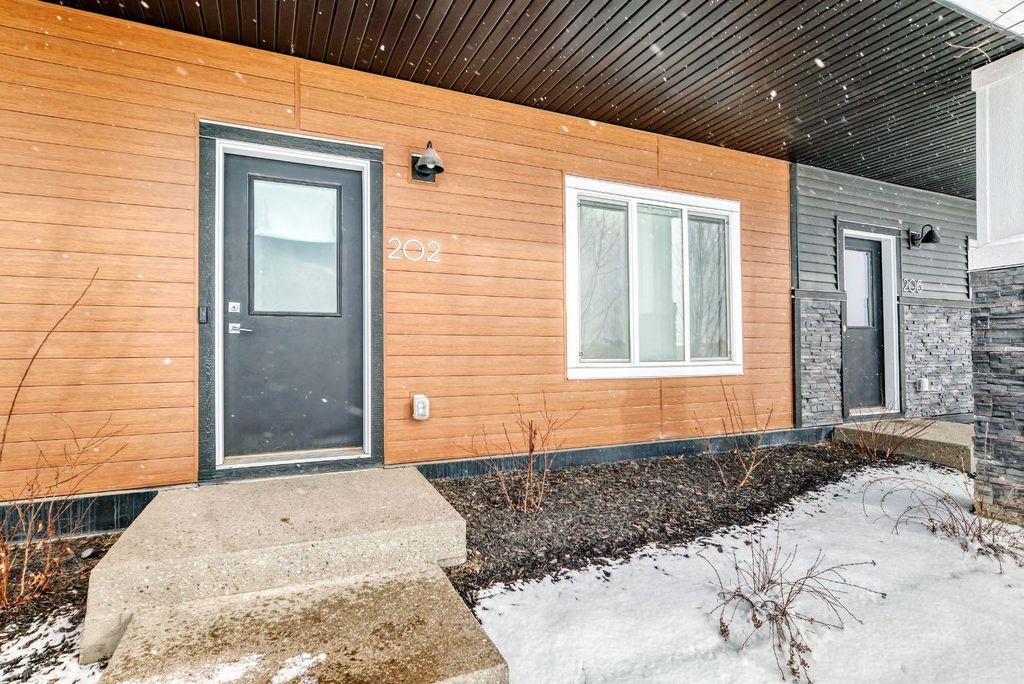 Photo of 202 CREEKSTONE Drive SW, Calgary, AB T2X 5L1 (MLS # A2292470)