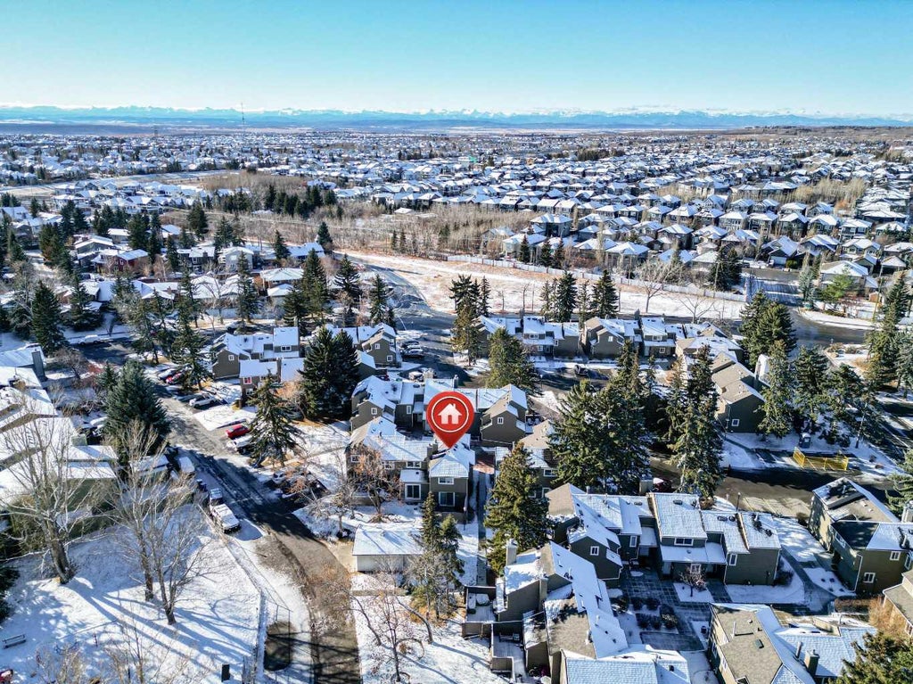 Photo of 829 Coach Bluff Crescent SW #1101, Calgary, AB T3H 1B1 (MLS # A2326699)
