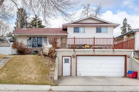 Photo of 7803 Hunterslea Crescent NW, Calgary, AB T2K 4M3 (MLS # A2267488)