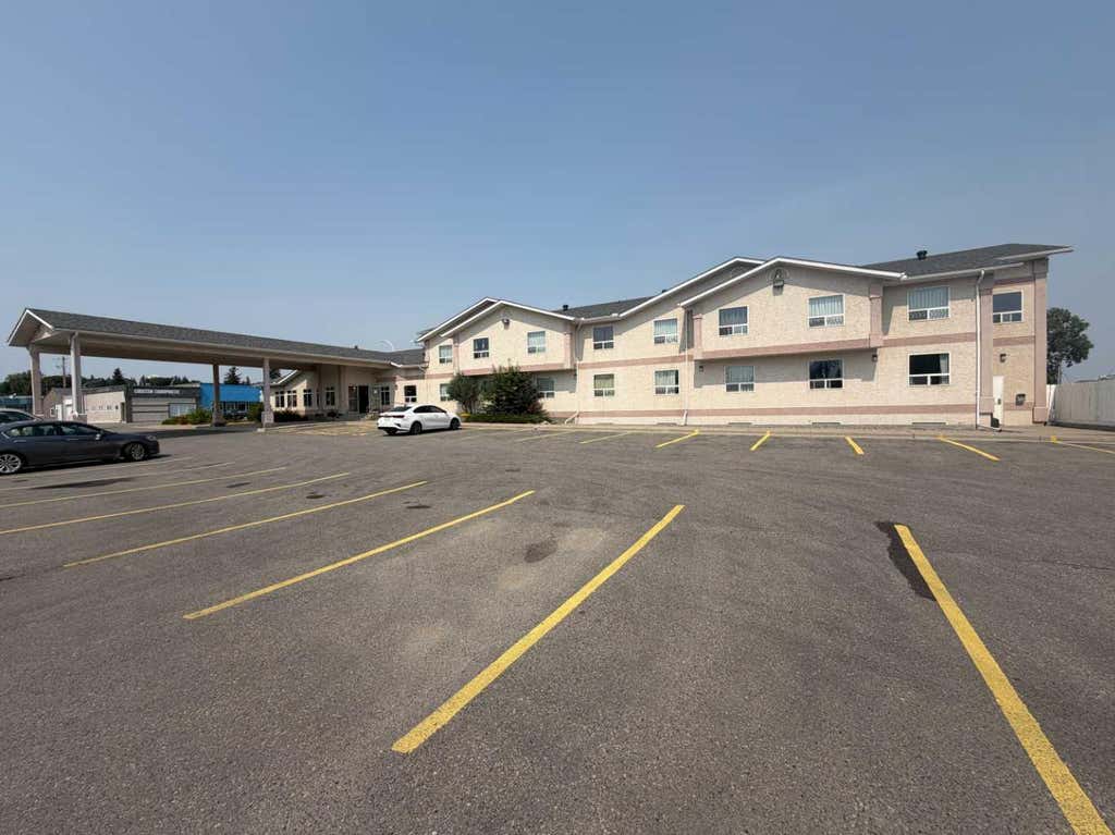 Photo of 404 Main Street, Cardston, AB T0K 0K0 (MLS # A2337741)