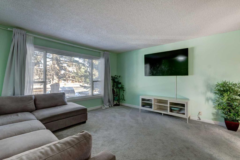 Photo of 1059 Pinecliff Drive NE, Calgary, AB T1W 3W8 (MLS # A2293445)