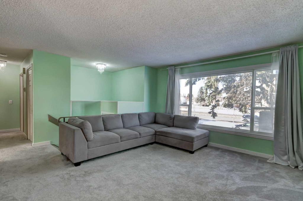Photo of 1059 Pinecliff Drive NE, Calgary, AB T1W 3W8 (MLS # A2293445)