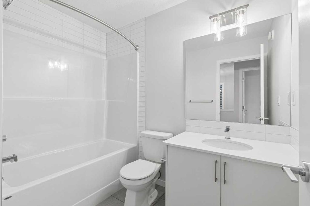 Photo of 32 Snowberry Common SE, Calgary, AB T3M 4G7 (MLS # A2355603)