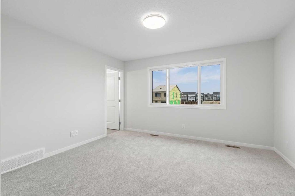 Photo of 32 Snowberry Common SE, Calgary, AB T3M 4G7 (MLS # A2355603)