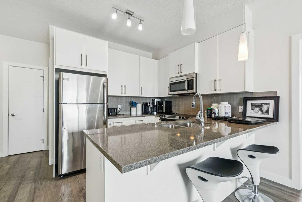 Photo of 12 Sage Hill Terrace NW #313, Calgary, AB T3R 0W6 (MLS # A2291331)
