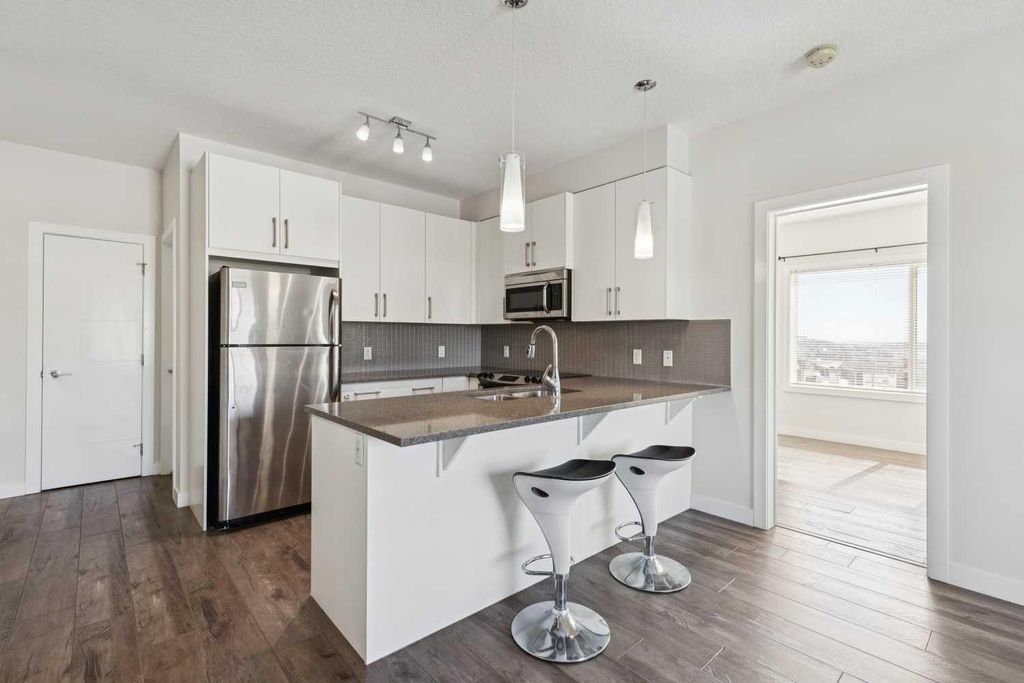 Photo of 12 Sage Hill Terrace NW #313, Calgary, AB T3R 0W6 (MLS # A2291331)