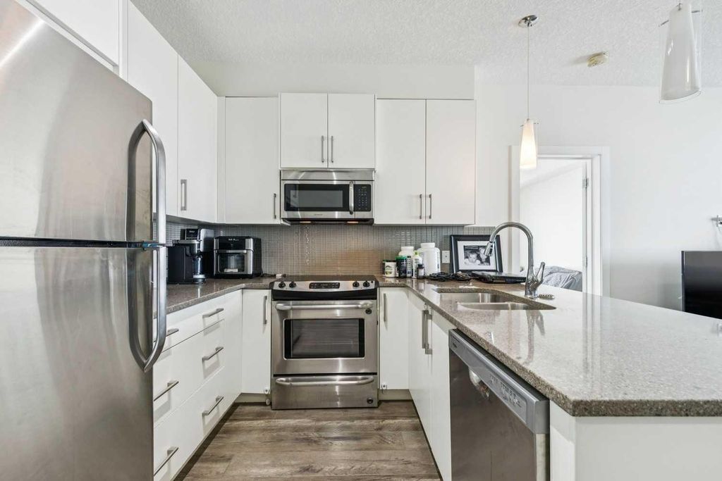 Photo of 12 Sage Hill Terrace NW #313, Calgary, AB T3R 0W6 (MLS # A2291331)