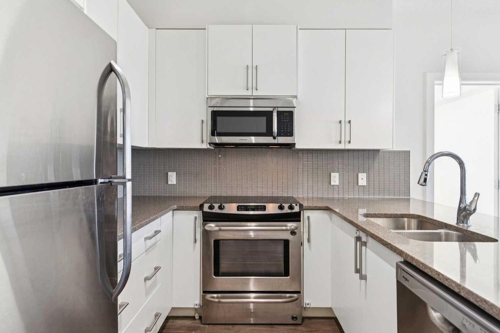 Photo of 12 Sage Hill Terrace NW #313, Calgary, AB T3R 0W6 (MLS # A2291331)