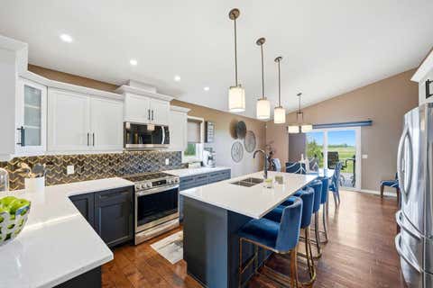 Photo of 164 Hillcrest Boulevard, Strathmore, AB T1P 0A3 (MLS # A2313623)