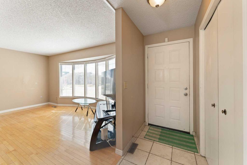 Photo of 7003 Temple Drive NE, Calgary, AB T1Y 4Z4 (MLS # A2307481)