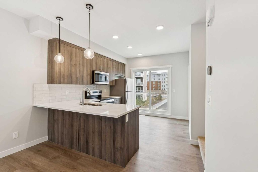 Photo of 107 Shawnee Square SW, Calgary, AB T2Y 0W4 (MLS # A2268566)