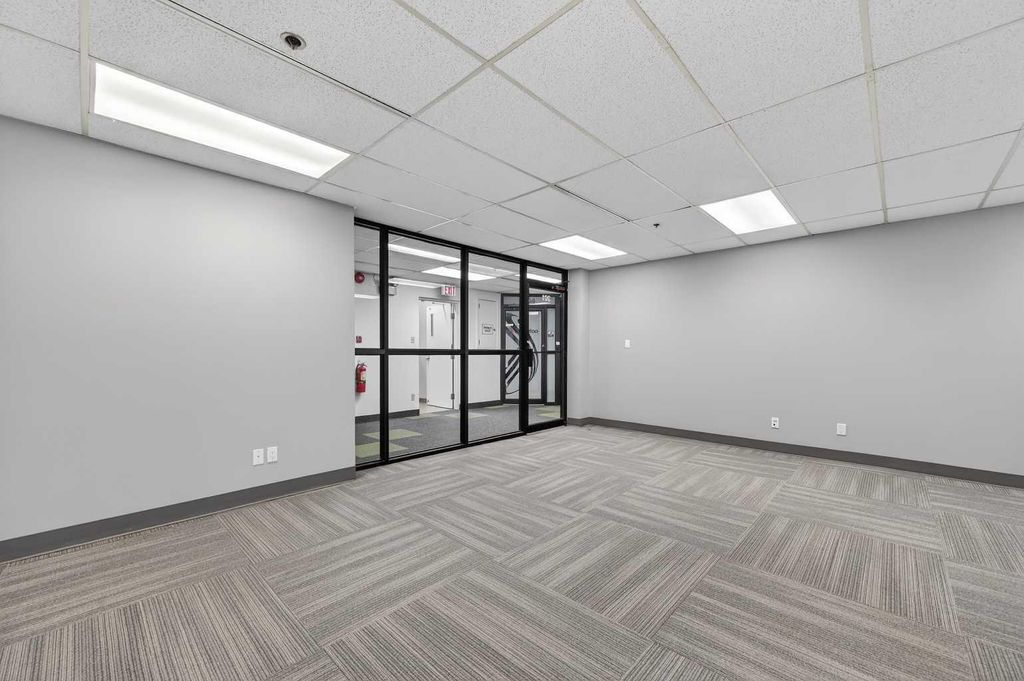 Photo of 1109 17 Avenue SW #201, Calgary, AB T2T 0B4 (MLS # A2289900)
