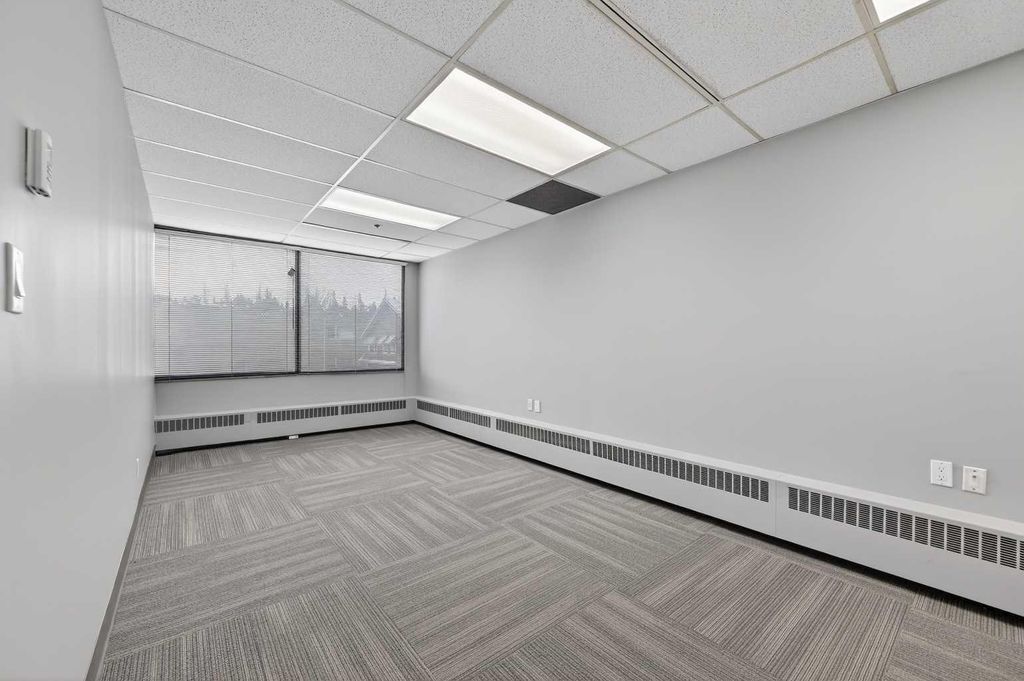 Photo of 1109 17 Avenue SW #201, Calgary, AB T2T 0B4 (MLS # A2289900)