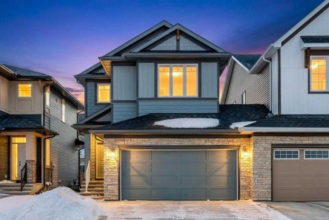 Photo of 53 Creekside Passage SW, Calgary, AB T2X 5V6 (MLS # A2279223)
