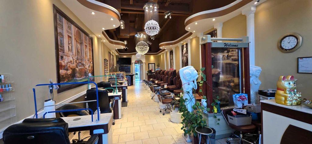 Photo of 99999 Mcleod Trail SE #4, Calgary, AB T2H 0L3 (MLS # A2287720)