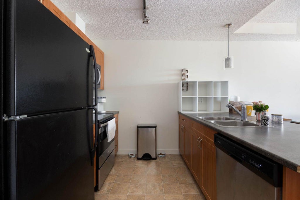 Photo of 136A Sandpiper Road #211, Fort McMurray, AB T9K 0J7 (MLS # A2345160)