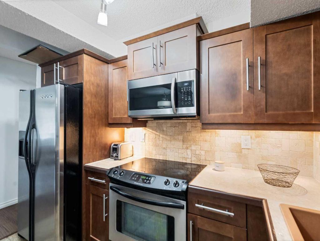 Photo of 1107 15 Avenue SW #101, Calgary, AB T2M 0S8 (MLS # A2283612)