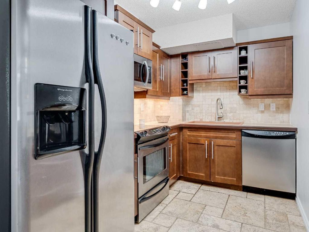 Photo of 1107 15 Avenue SW #101, Calgary, AB T2M 0S8 (MLS # A2283612)