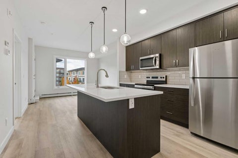 Photo of 655 Shawnee Square SW #309, Calgary, AB T2Y 1E3 (MLS # A2351504)