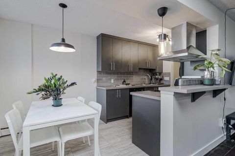 Photo of 4455C Greenview Drive NE #105, Calgary, AB T2E 6M1 (MLS # A2266749)