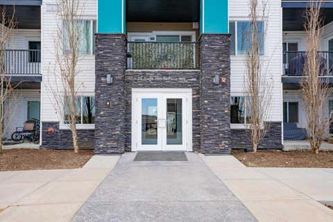 Photo of 20 Sage Hill Terrace NW #111, Calgary, AB T3R 0W8 (MLS # A2335088)