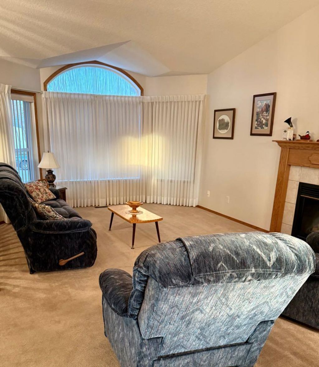 Photo of 915 Highland Green Drive NW, High River, AB T1V 1V8 (MLS # A2303971)
